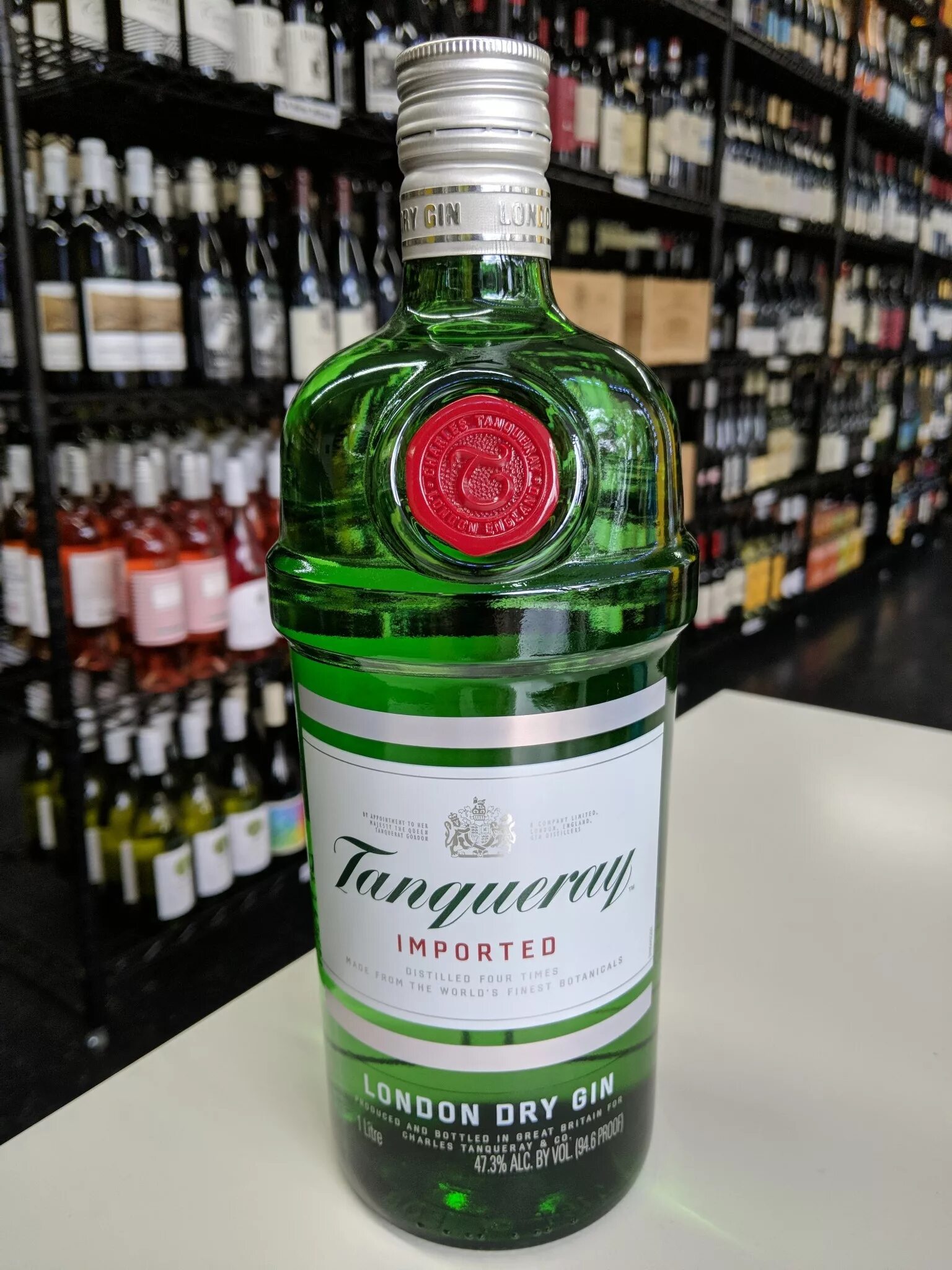 Джин танкерей. Джин Tanqueray Dry 1l. Tanqueray London Dry. Джин Tanqueray London. Джин Танкерей Лондонский сухой.