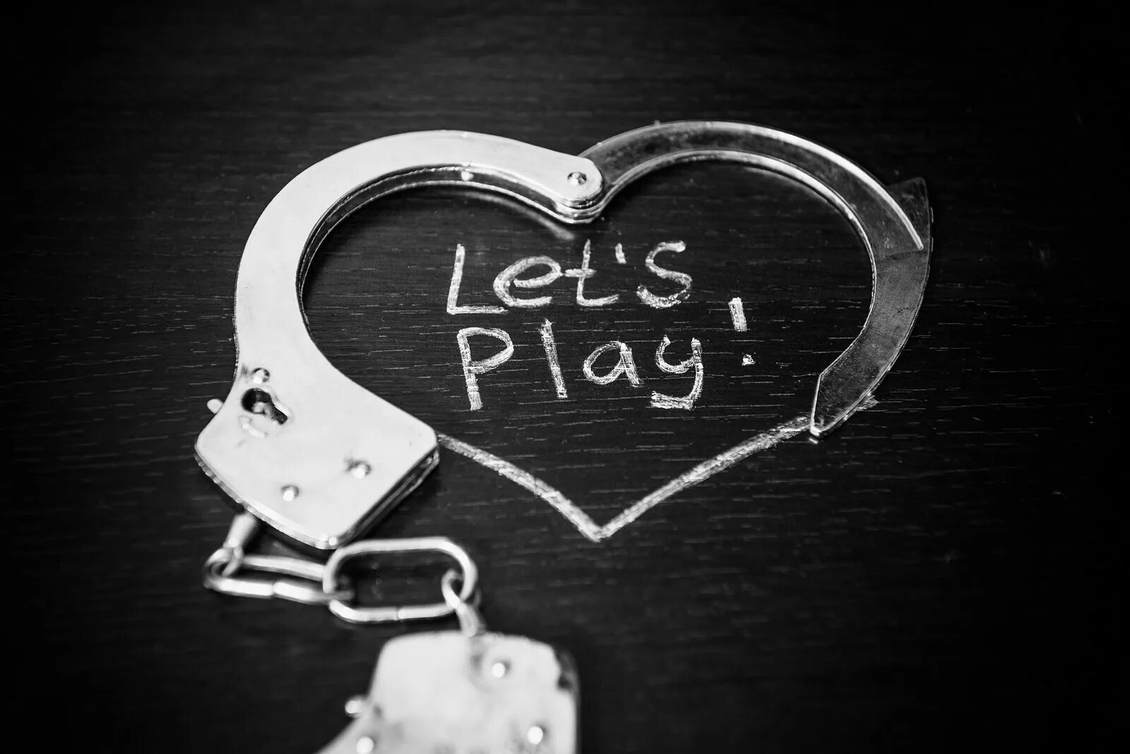 Let him play. Handcuffs Heart.