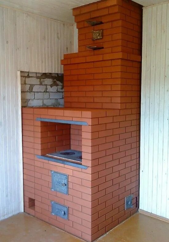 Отопительная кирпичная печь 100кв. Печка кирпичная для дачи. Маленькие печки фото. Отопительная кирпичная печь 100кв. Печь для дачи из кирпича.