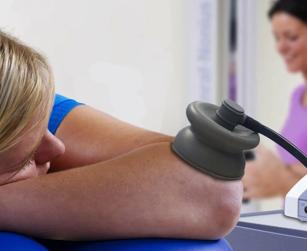 эпикондилит локтевого ударно волновая. тейп-лента кинезиологическая. физиотерапия локтевого сустава. лента для суставов. эувт экстракорпоральная ударно-волновая.