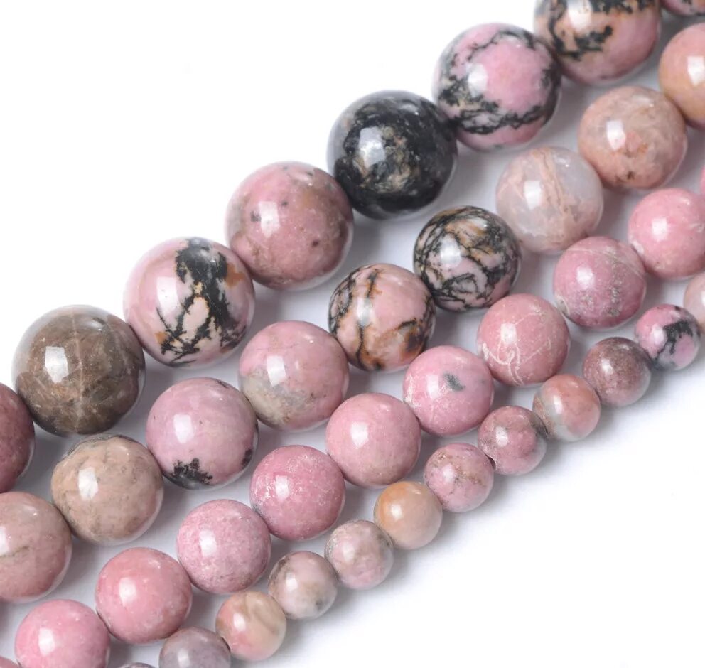 Пятнистый родонит. Кобальтовый родонит. Кобальтовый родонит. Однородный рубиновый родонит. Камень рубиновый родонит.