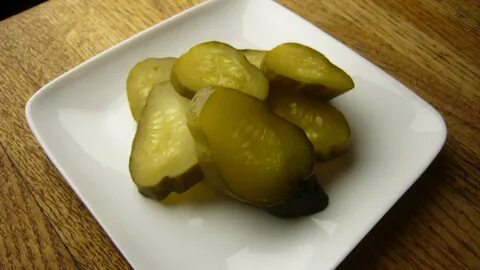 Маринованный огурец нарезанный