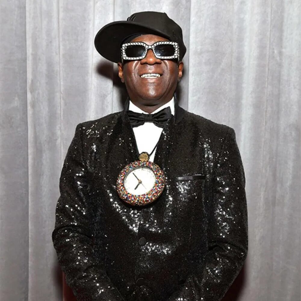Флэв знаменитость. Флейвор флав с женой. Flavor flav net worth 2015. Рэпер флавор флав. Флейвор флав сейчас.