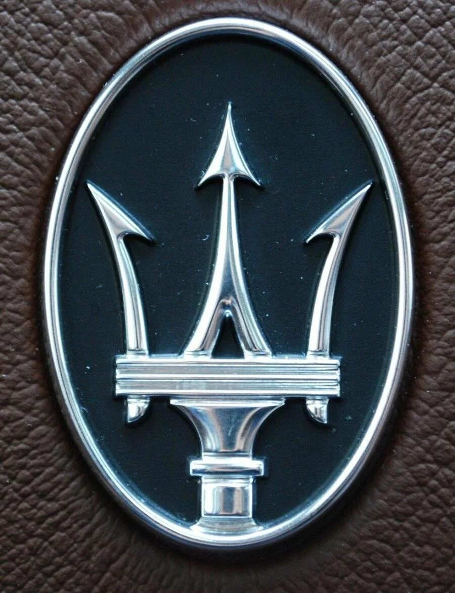 Машина знак трезубец