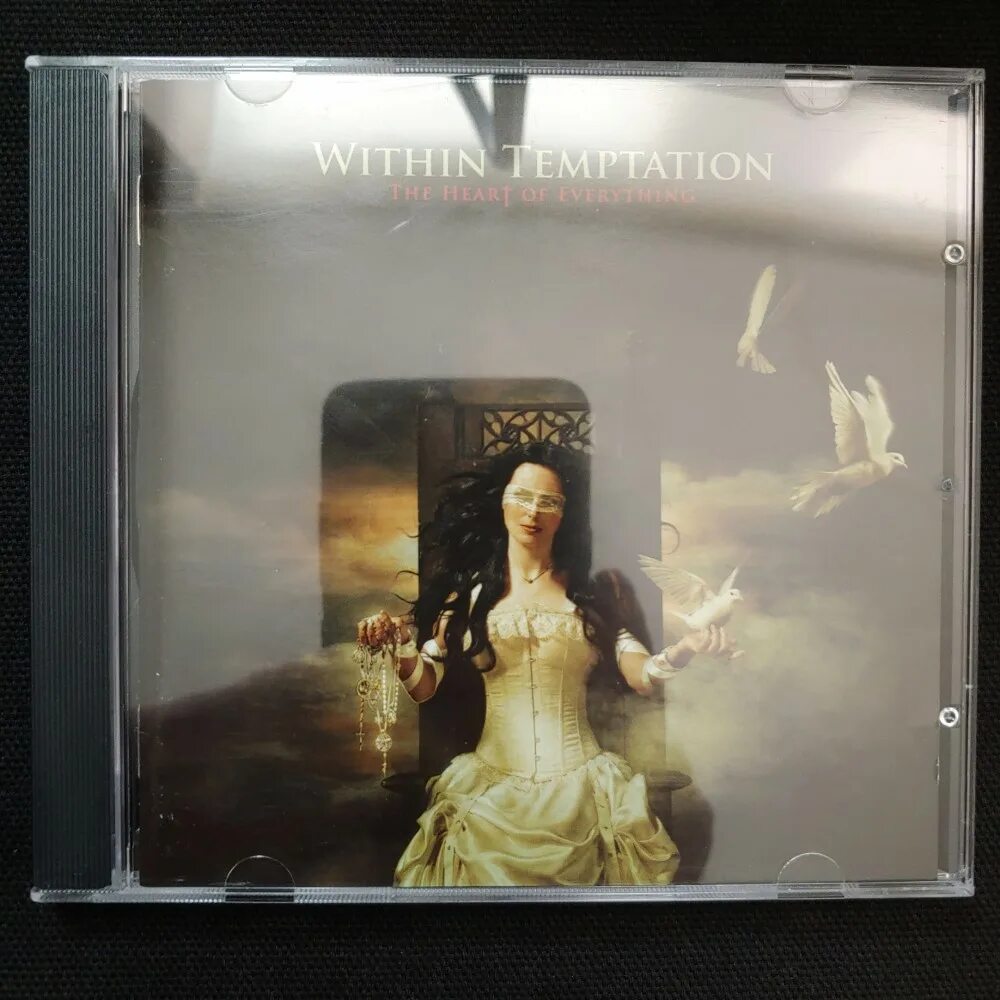 Within temptation альбомы. Within Temptation the Heart of everything 2007. Within Temptation the Heart of everything альбом. Within Temptation the Heart of everything обложка. Within Temptation - the Howling обложка.