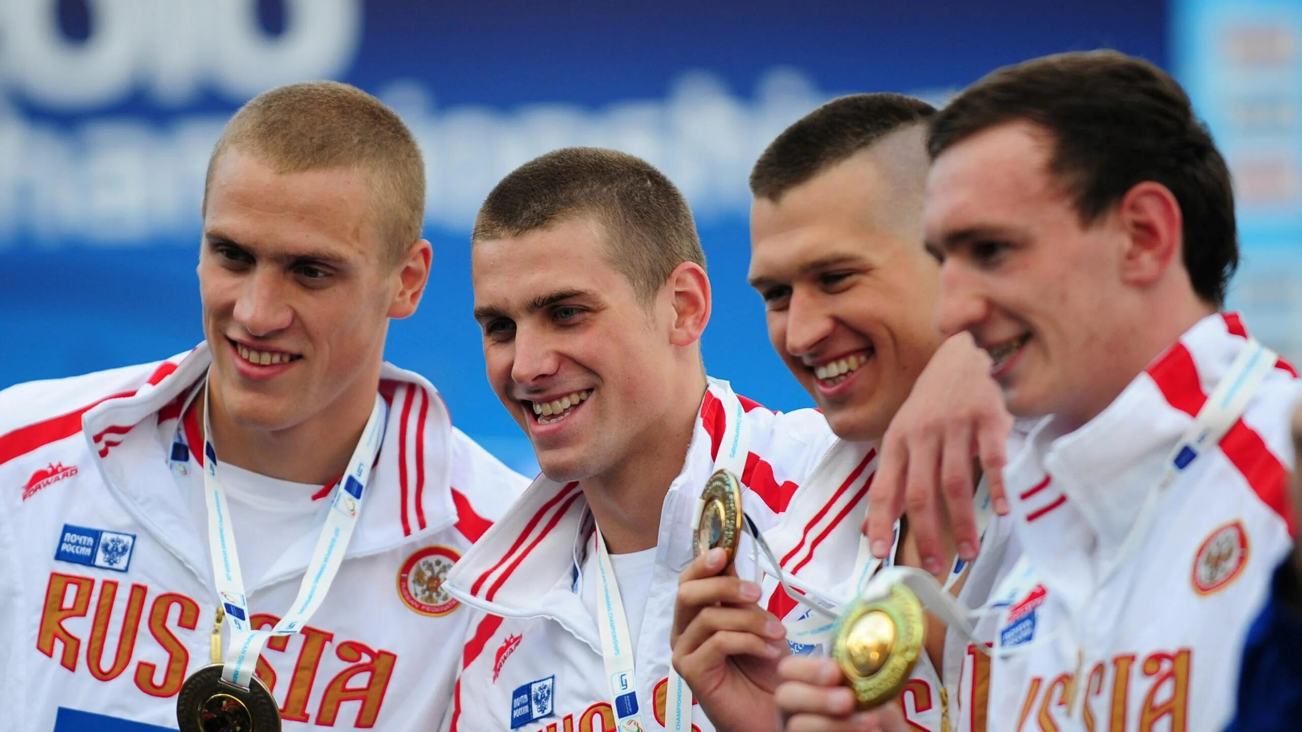 победители олимпийских игр. медали для олимпийцев.