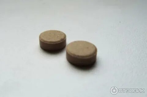 Коричневый круглый таблетка