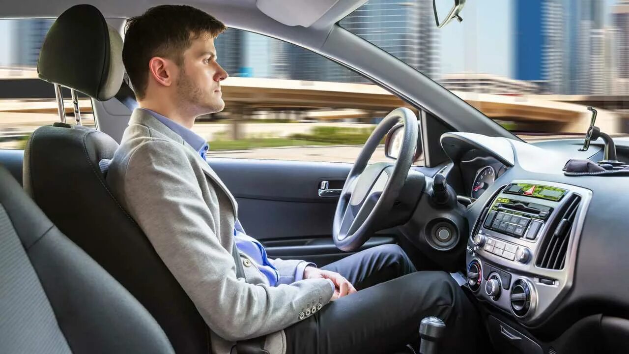 Driving a car a man. Driving a car a man