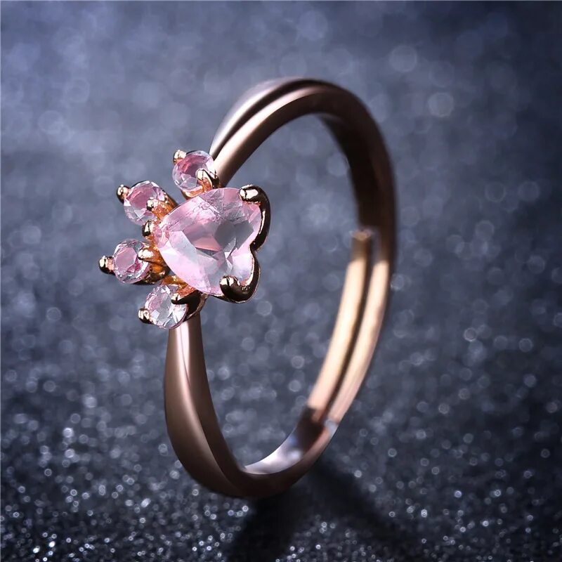 Розовое золото кольцо. Кольцо из розового золота. Кольцо Кошачья лапка золото. Золотое кольцо с кошачьей лапкой.