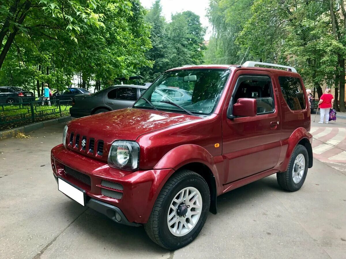 Машины сузуки с пробегом. Suzuki Jimny 2007 красный. Suzuki Jimny 2007. Сузуки Jimny 2007. Suzuki Jimny III Рестайлинг 1, 2007.