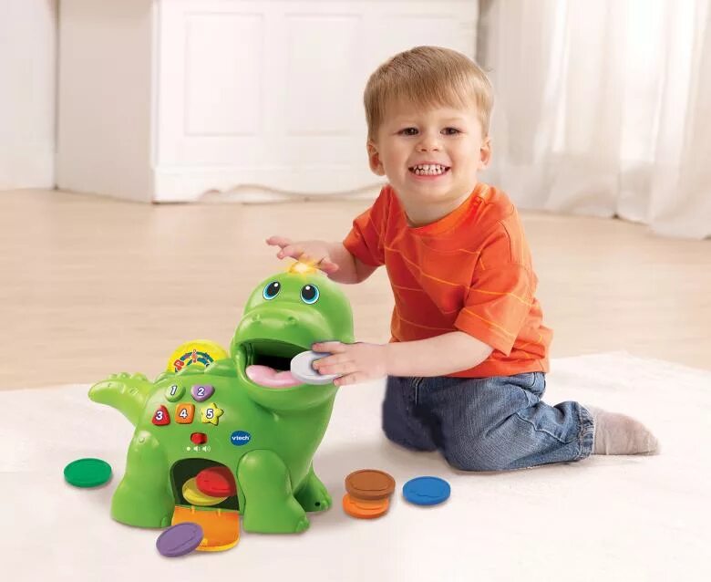 Что подарить ребенку на 2 года мальчик. Игрушка Vtech Dino. Обучающая игрушка Сластена Дино 30 см со светом и звуком. Необычные игрушки для мальчиков. Игрушки для годовалого.