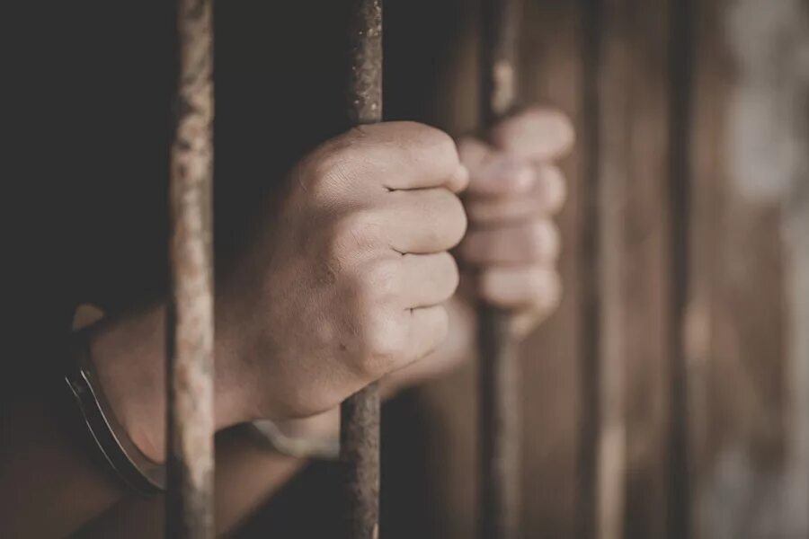 Put in prison