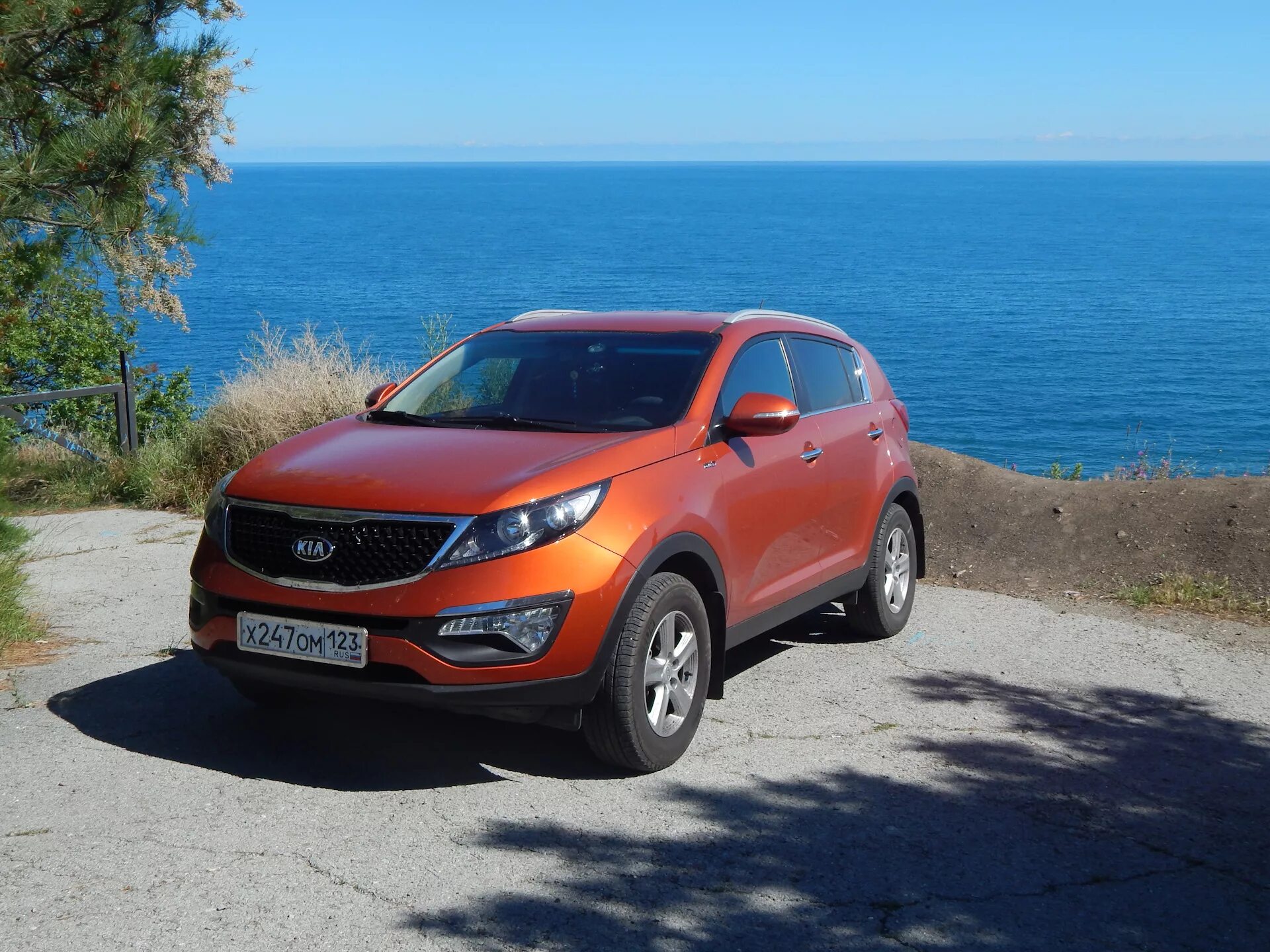 Купить киа спортаж 3. Киа Спортейдж терракот. Kia Sportage Sea. Киа Спортейдж и море.