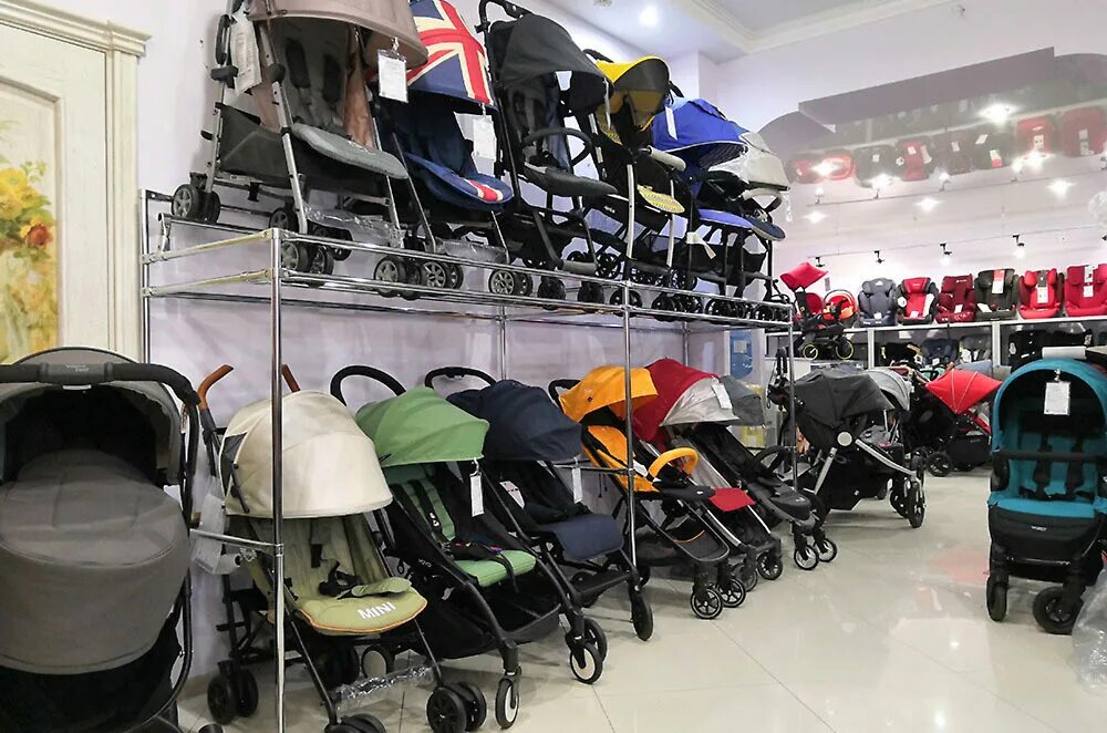 Первая коляска нижний. Mothercare коляска прогулочная серая с салатовым. Коляска tenerezza. Первая коляска нижний. Магазин колясок в тюмени.