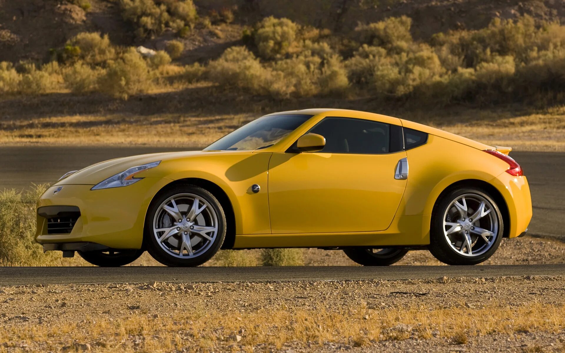 Картинки ниссан. Nissan 370z желтый. 370z Nissan z1. Nissan 370z us-spec cars Coupe 2009. Nissan 370zx.