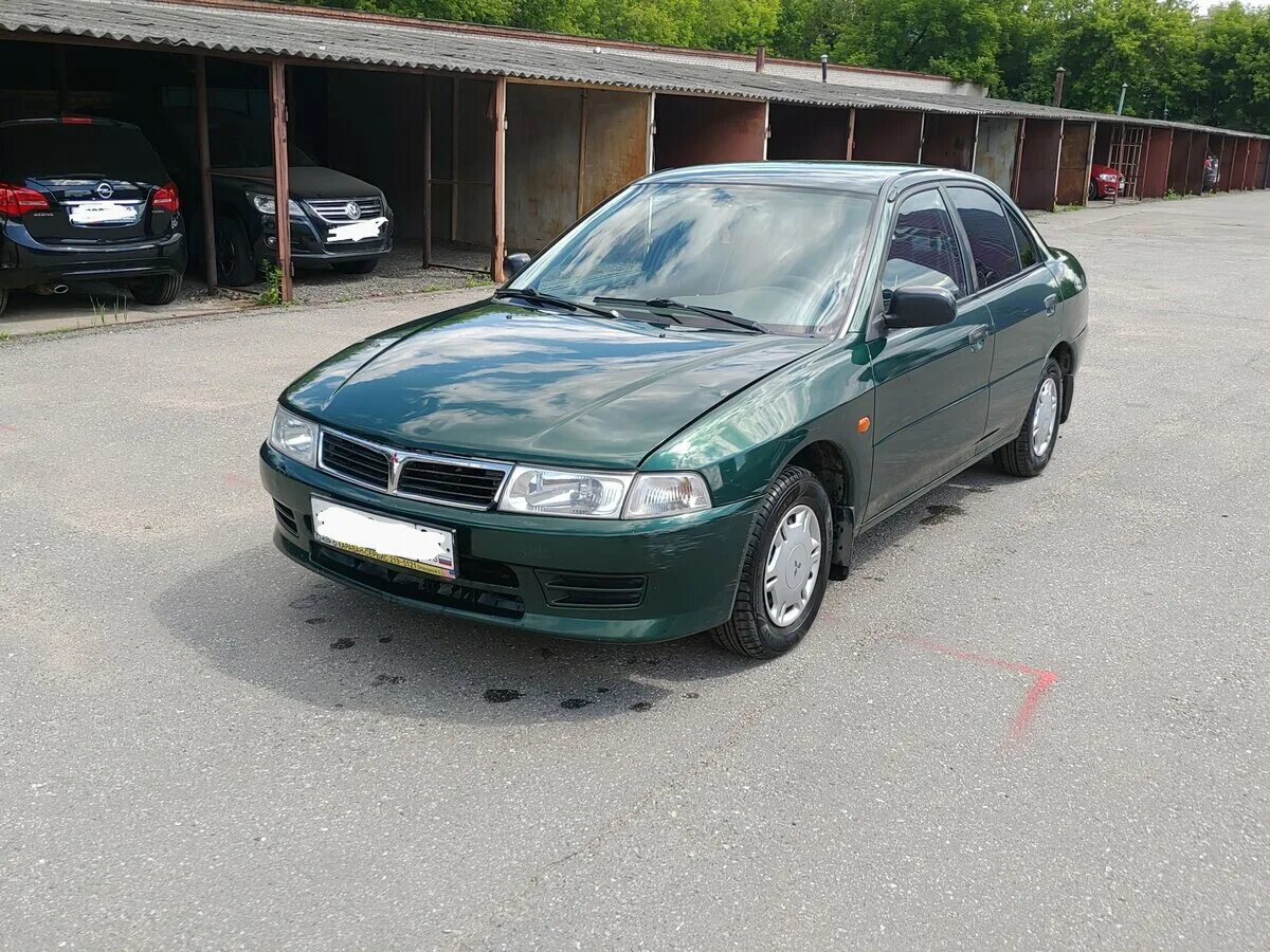 Митсубиси 98 года. Mitsubishi Lancer 1998. Mitsubishi Lancer 1998 1.3. Мицубиси Лансер 1998. Митсубиси Лансер 7 1998.