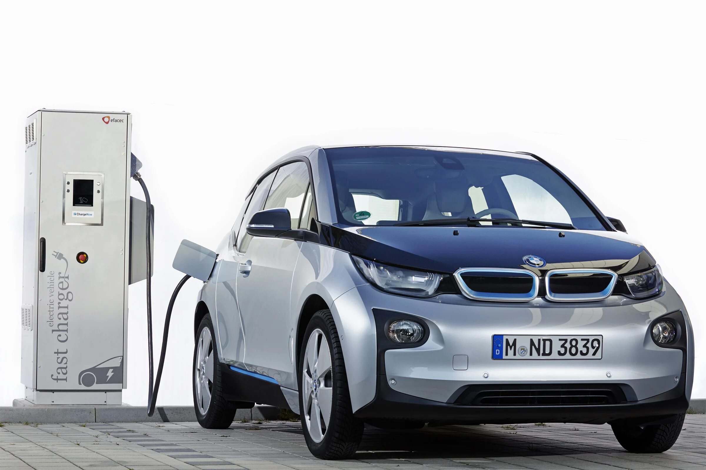 BMW i3 электромобиль седан. BMW i3 2025. BMW электрокар 2023. BMW i3 гибрид зарядка.