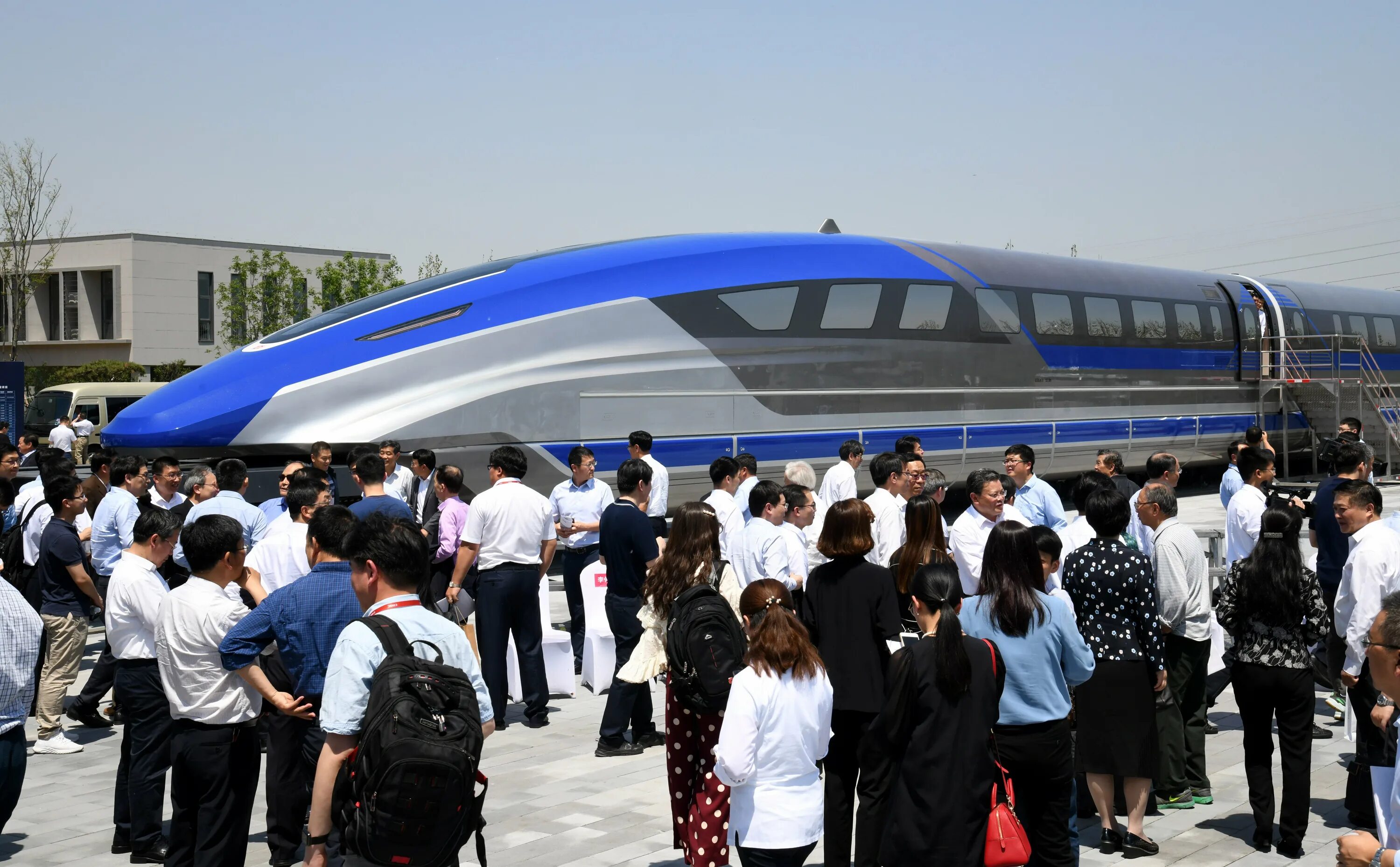 Поезд возрождение. Поезд на магнитной левитации Китай. Скоростной поезд Маглев в Китае. Маглев Шанхай. Маглев в Шанхае 2020.