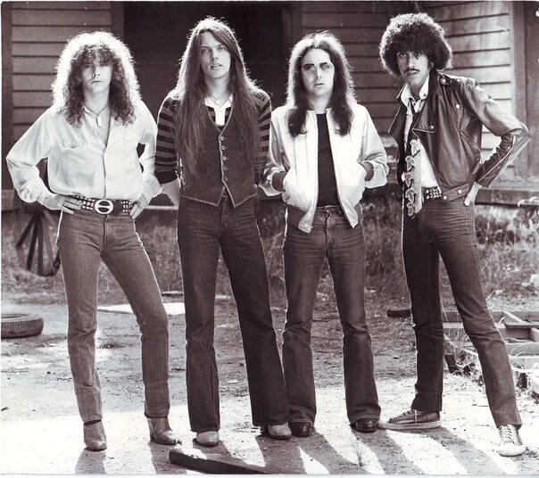 Thin Lizzy. Тин Лиззи группа. Thin Lizzy 1971. Thin Lizzy Fighting 1975. Тин лиззи