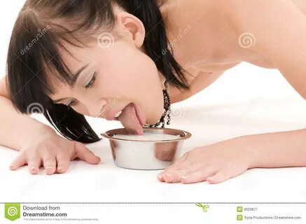 Photo about Picture of naked woman drinking milk from cat bowl. 