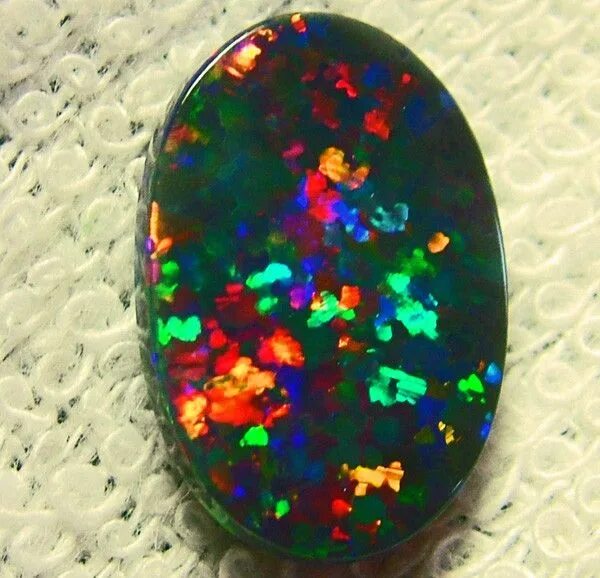 Carved Black Harlequin Opal - Lightning Ridge, Australia