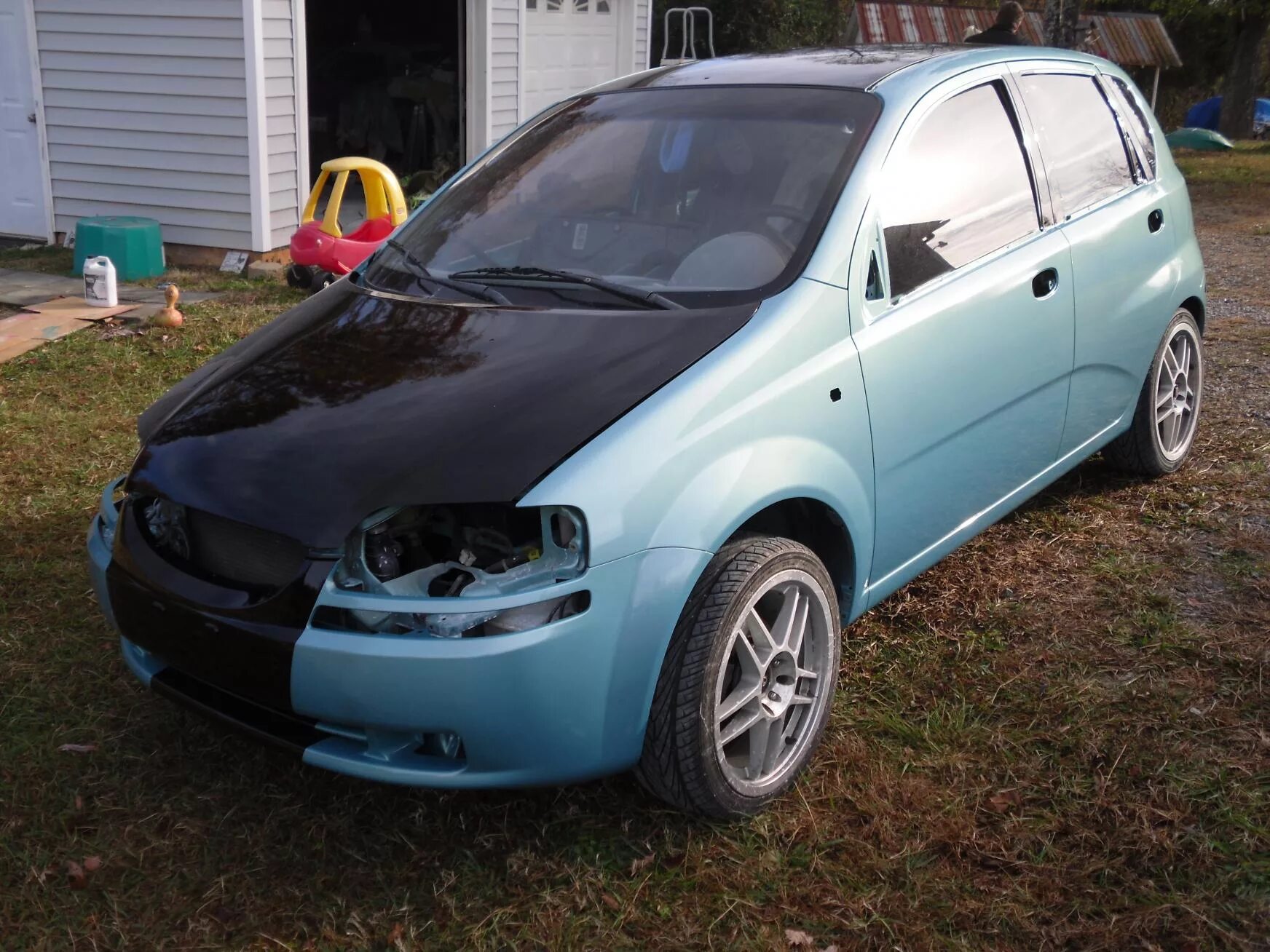 Шевроле авео т200 хэтчбек. Авео хэтчбек 2005. Chevrolet Aveo t200 хэтчбек обвес. Chevrolet Aveo 2007 хэтчбек т200 тонированный. Шевроле Авео 2005 хэтчбек поколение т200.