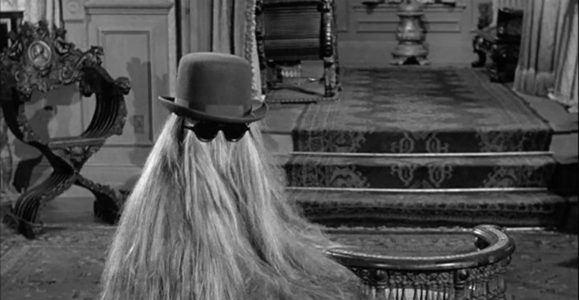 Семейка аддамс кузен итт. Кузен ит семейка адамс. Кузен фото. Кузен фото. Семейка аддамс кузен оно.