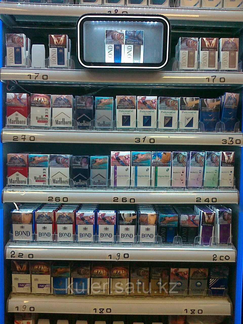 оператор-кассир азс. сигареты в магните. табак в магните. блок сигарет бонд компакт. ротманс деми мандарин.