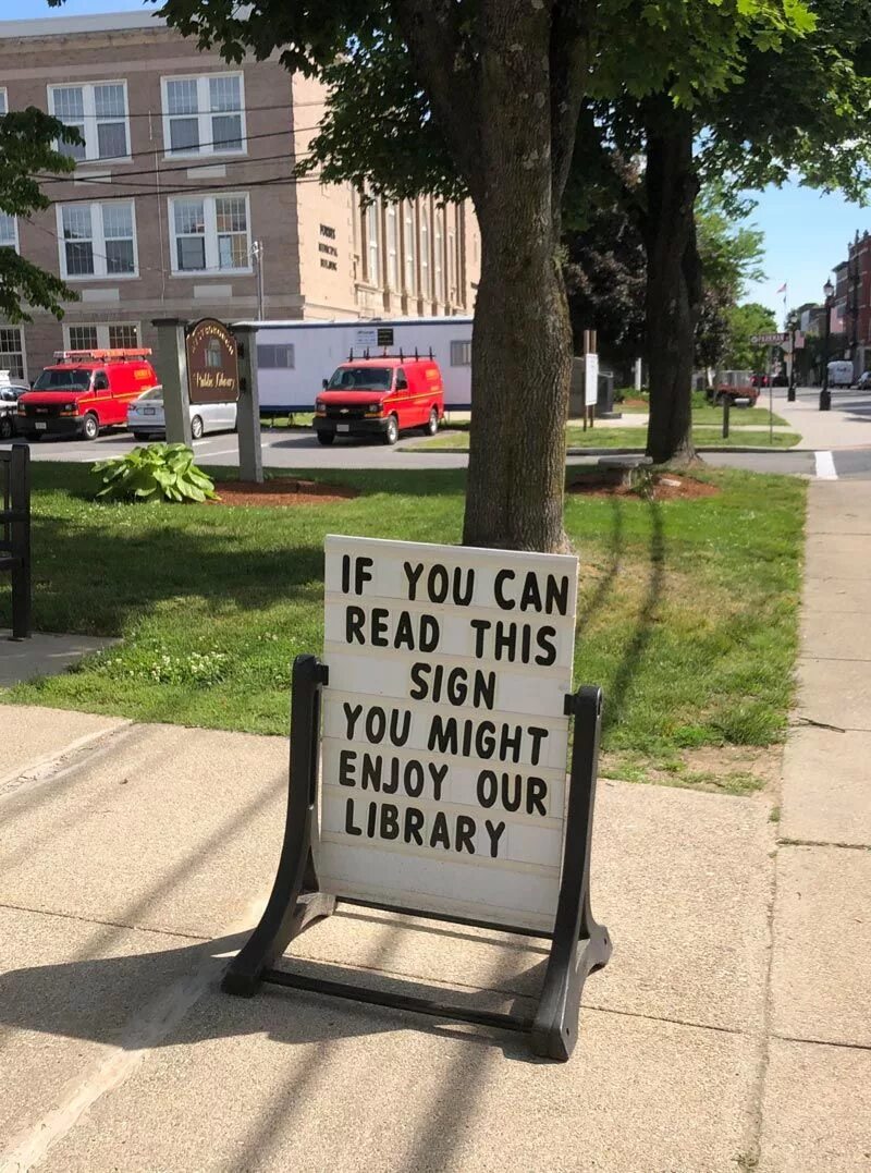 This is our library. Ads Library. Read this sign. Library Creative ads. They can be seen in our Library.
