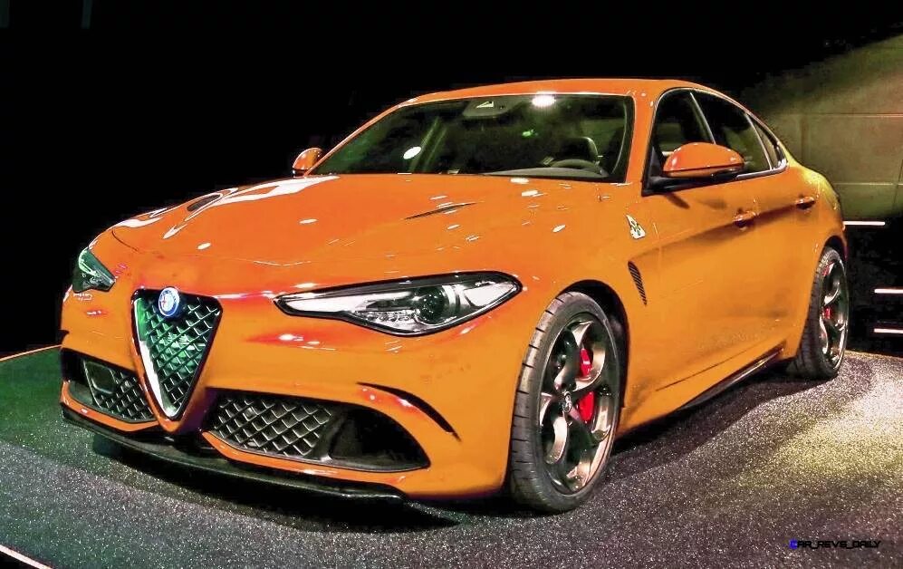 Alfa is. Alfa Romeo Giulia Квадрифолио. Alfa Romeo Giulia оранжевый.