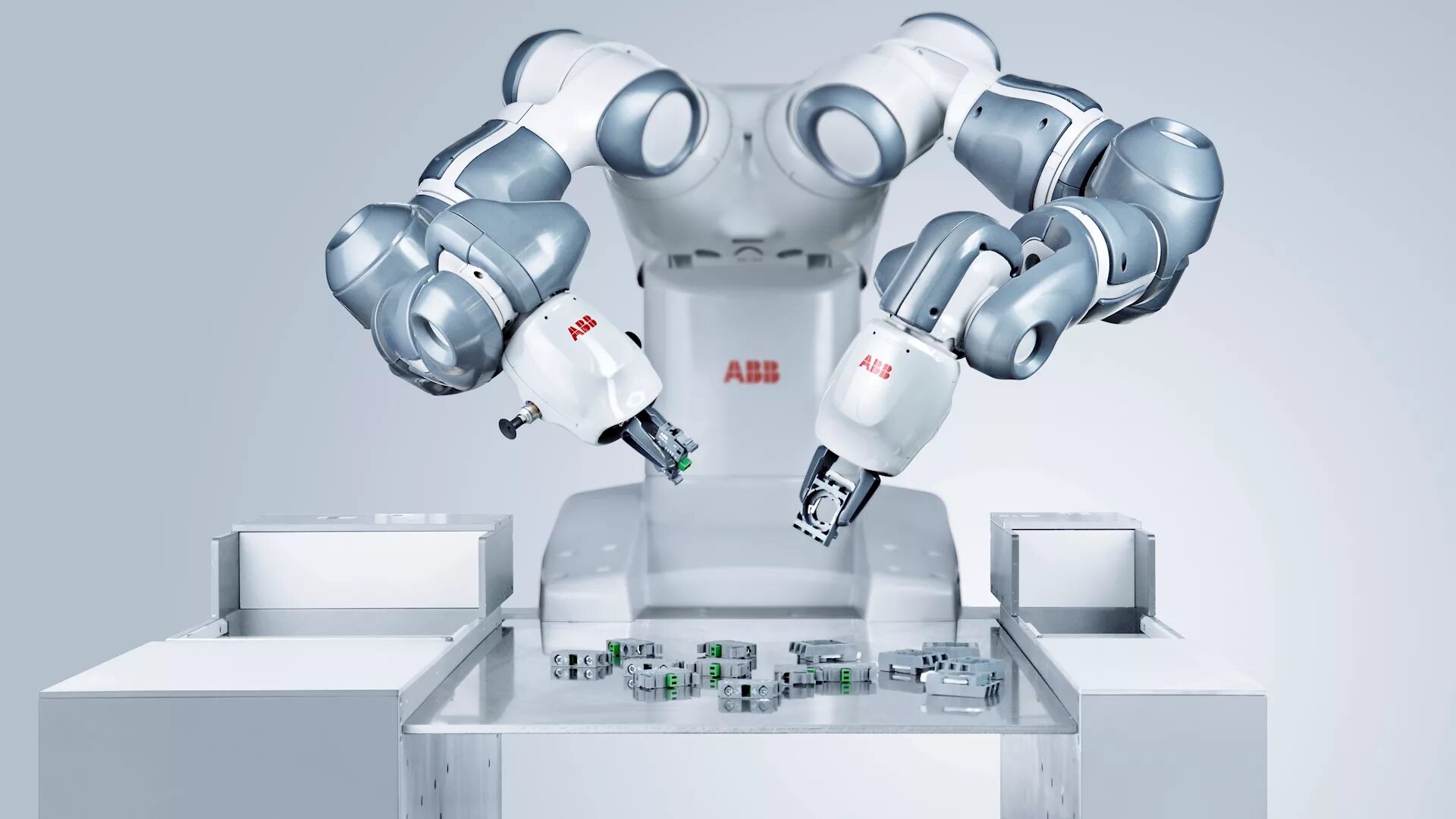 Стационарные роботы примеры. Коллаборативный робот ABB. Промышленные роботы ABB. ABB Yumi IRB 14000. ABB Robotics Yumi.