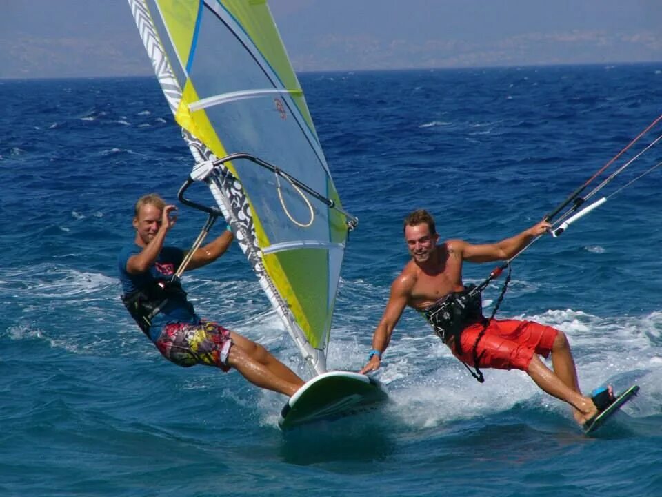 Complete the exchanges he is on windsurfing
