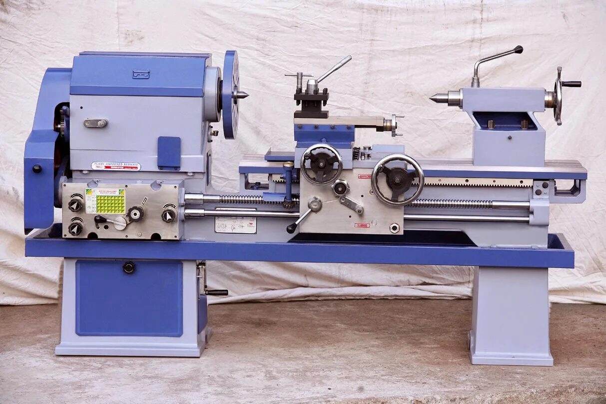 Lathe machine. Fully automatic lathe. htc 2535 lathe machine. apollo tutor lathe. indian manufacturer of iol lathes.