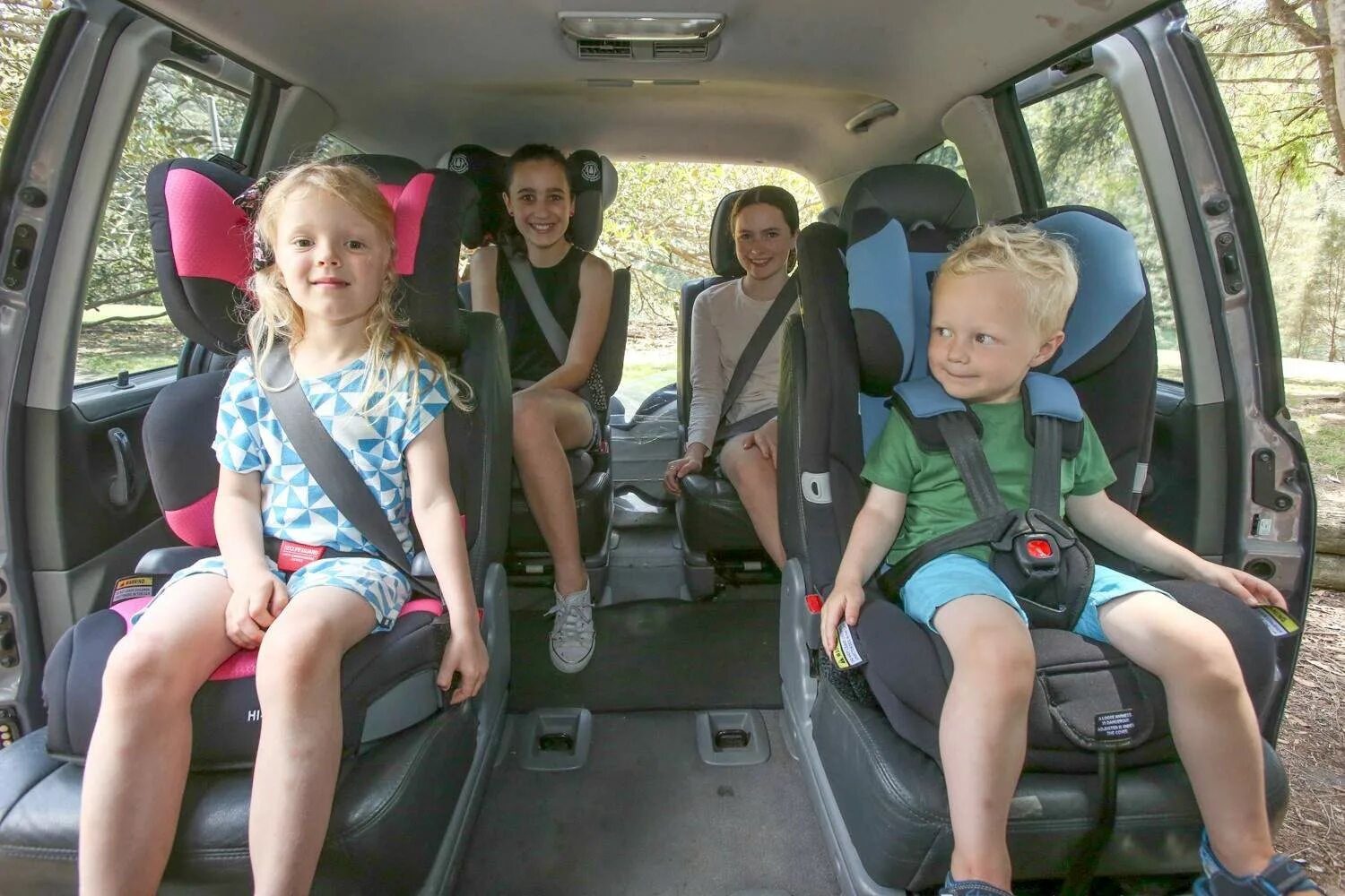 Diapered Kids car Seat. Kids diapers in car Seat. Kids diapers in car back Seat. Child sitting in Baby Safety Seat.