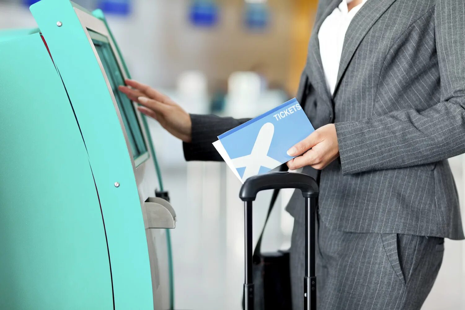 Check in here. Check in desk at the airport. checking in at the airport. check in airport. check in counter at the airport.