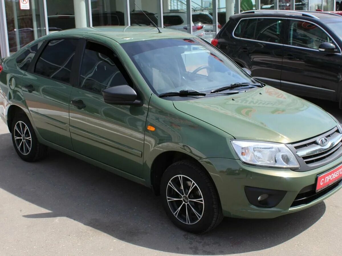 Гранта цвет аллигатор 309. Лада гранта цвет агава. Лада гранта зеленая 2011. Лада гранта седан салатовый цвет. Лада гранта лифтбек зеленая.