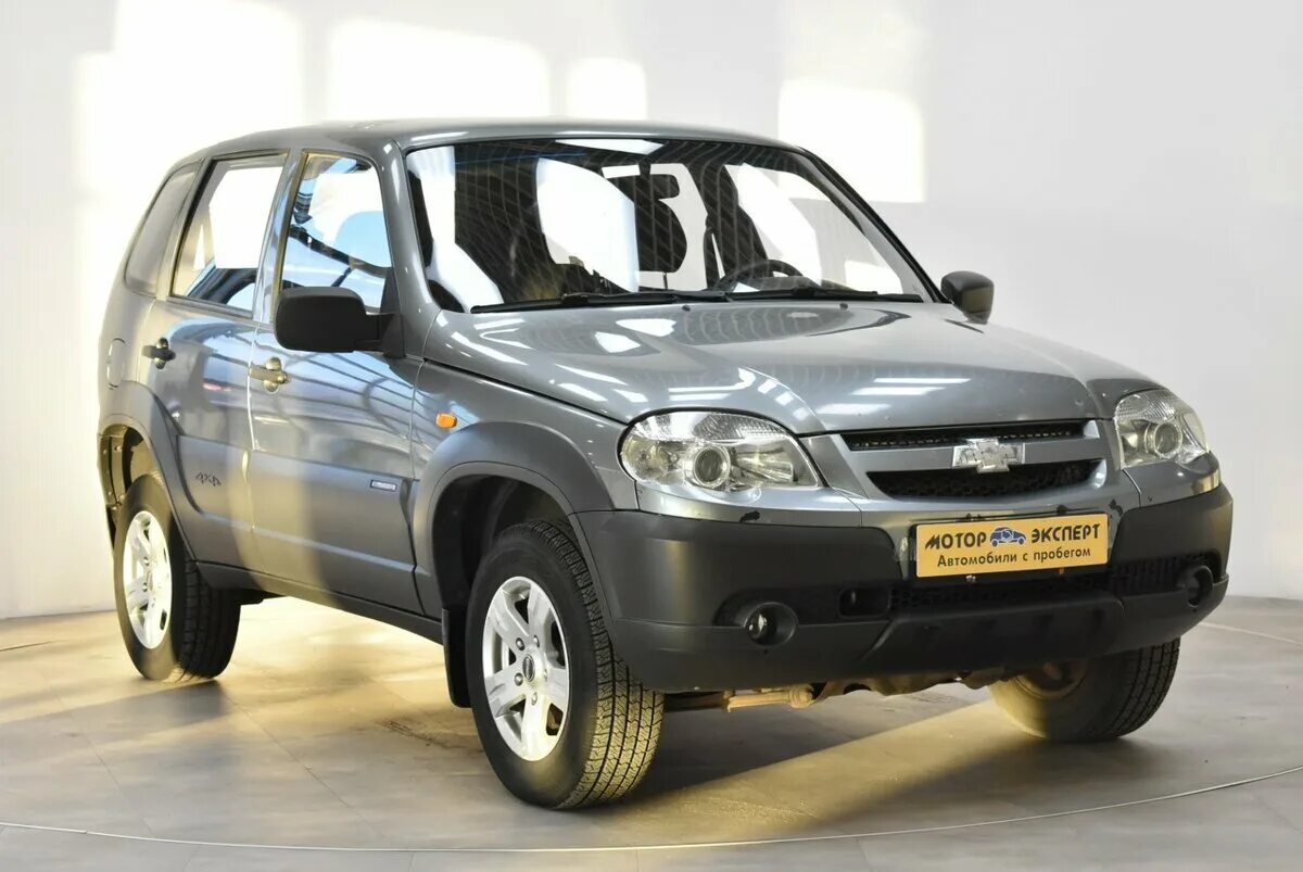 Chevrolet Niva 1999. Chevrolet Niva 2121. Нива Шевроле 1 поколение. Нива Шевроле 1 поколение серая. Купить ниву шевроле с завода цена