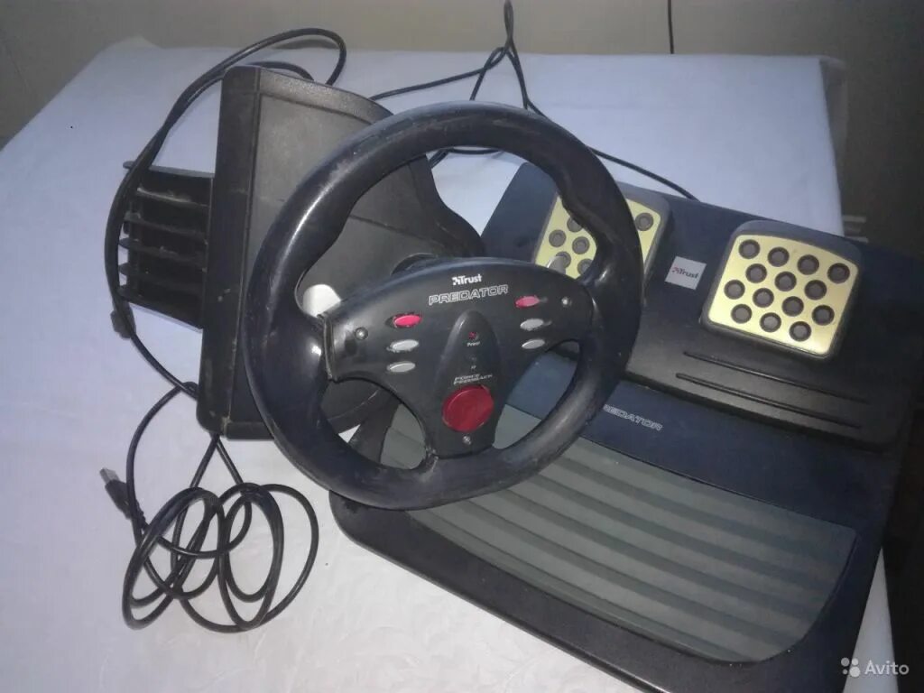 Рули trust. Trust predator руль. trust force feedback steering wheel gm-3500r. руль trust gm-3400 predator. игровая приставка с рулем и педалями траст gm 3500 r.
