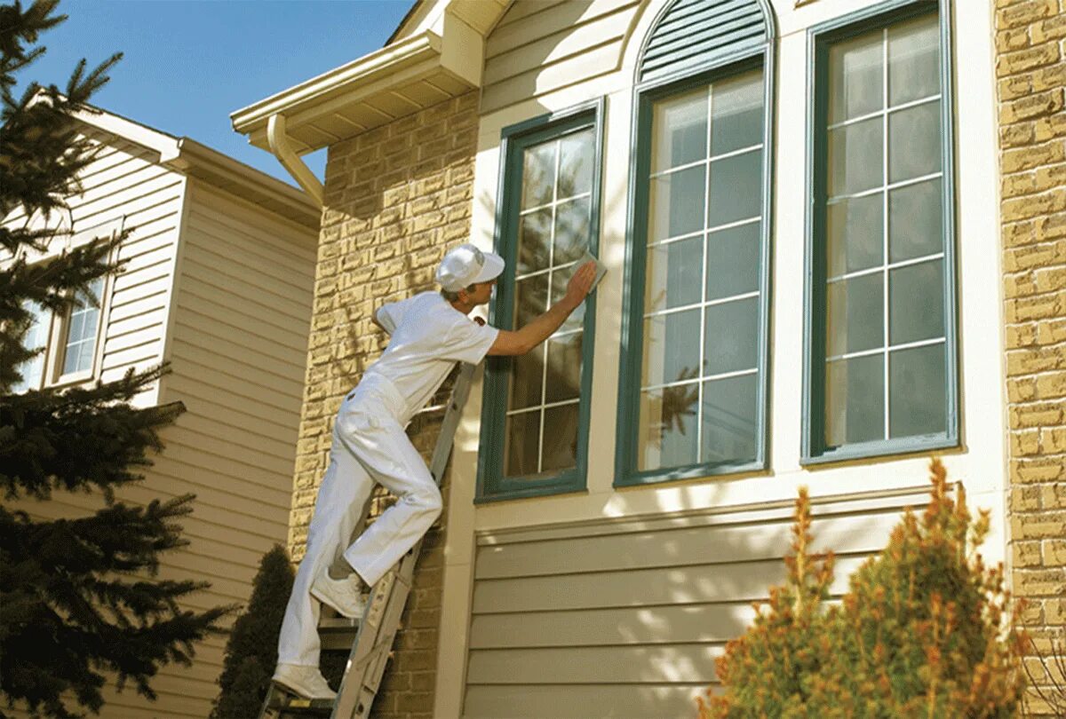 The house looks different you paint it. Exterior painters. exterior painting. exterior house painting worker. paint house.