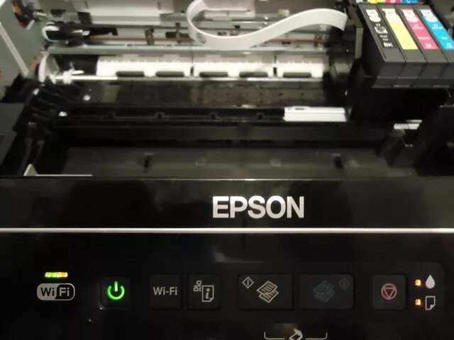 Почему принтер горит оранжевым. Принтер Эпсон l366. Принтер Эпсон 366. Эпсон l355 печатающая головка. Головка картриджа Epson tx650.