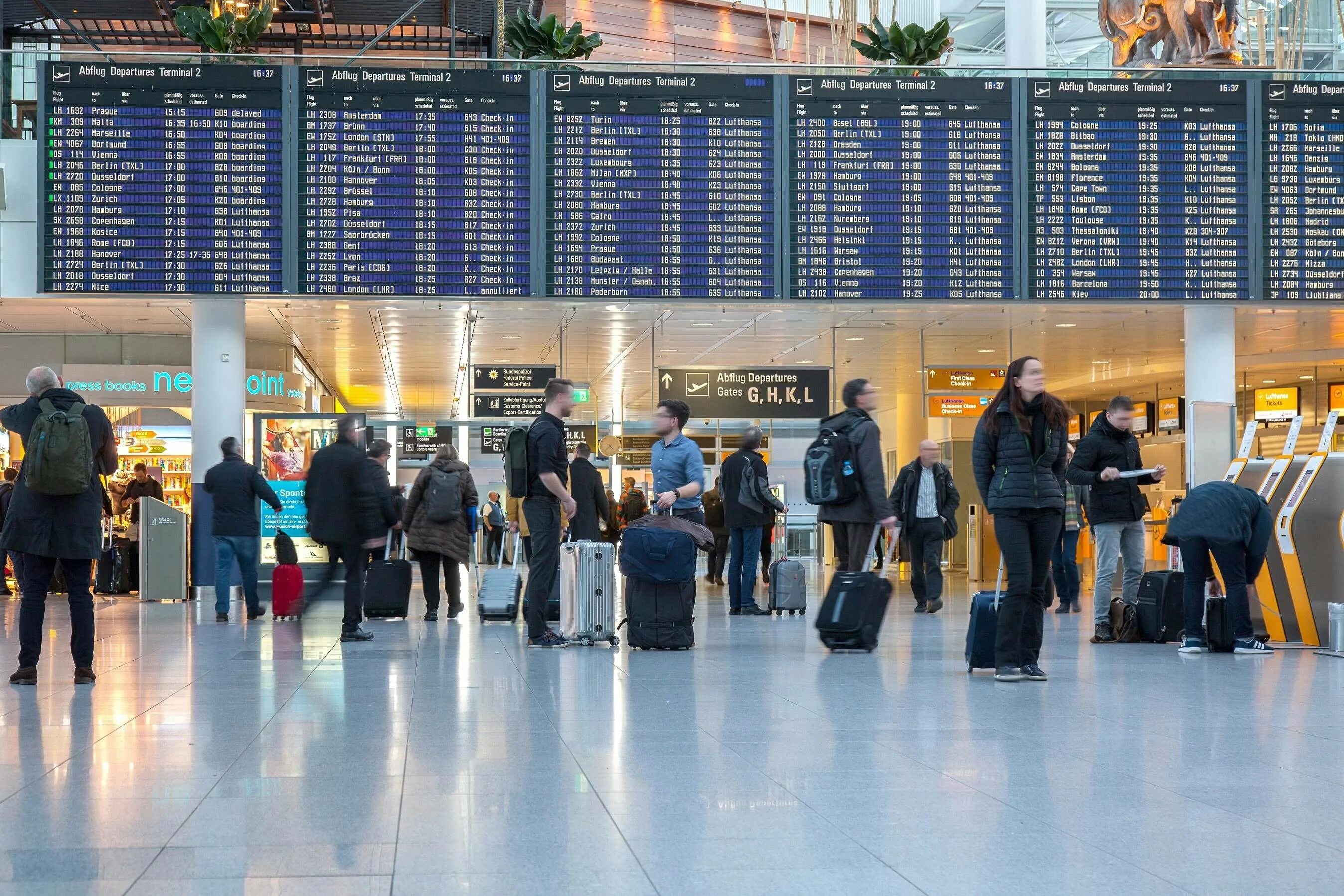 Мюнхенский аэропорт (Flughafen München) в Германии. Аэропорт Мюнхена терминал 2. Аэропорт Мюнхен пассажиропоток. Umna аэропорт. Departure check