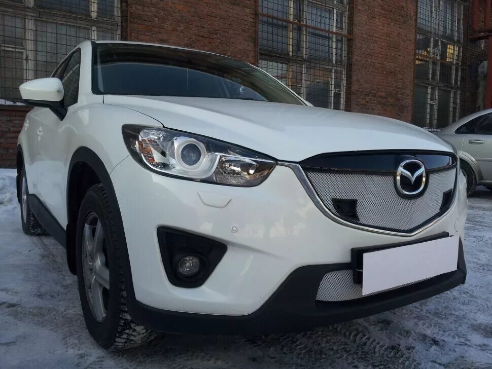 Решетки мазда сх5. Решетка радиатора Мазда сх5 2014. Защита радиатора Mazda CX-5 2012. Mazda cx5 (2012-2015) решетка радиатора. Решетка Mazda CX-5.