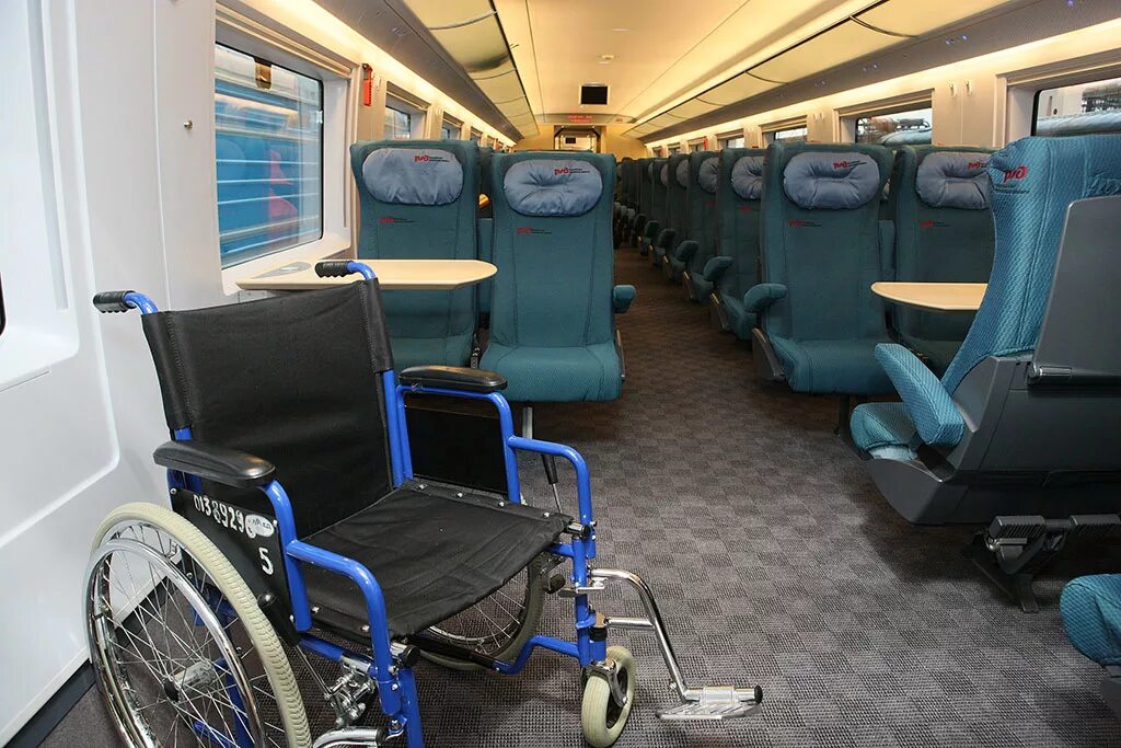 Купить места для инвалидов в поезде. Сапсан вагон для инвалидов. Вагон 06 Сапсан. Сапсан вагон внутри эконом. 6 Вагон Сапсан места инвалидов.