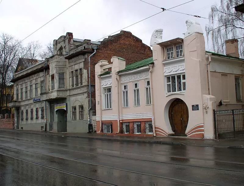 Модерн нижний. Улица Пискунова Нижний Новгород шахматный дом. Игорный дом Троицкого Нижний Новгород. "Шахматный дом" (дом с авгурами), Нижний Новгород. Дом с авгурами в Нижнем Новгороде.