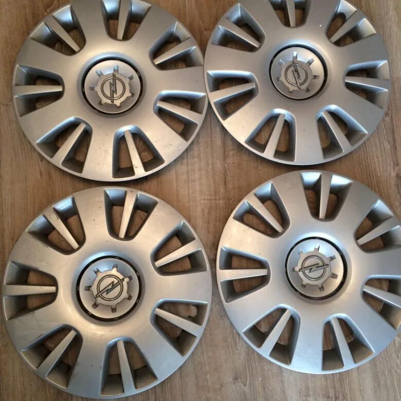 колпаки на колеса r16 опель. колпак опель астра н r16. колпаки на диски r16 для опель мока. Opel omega a колпак. оригинальные колпаки опель.