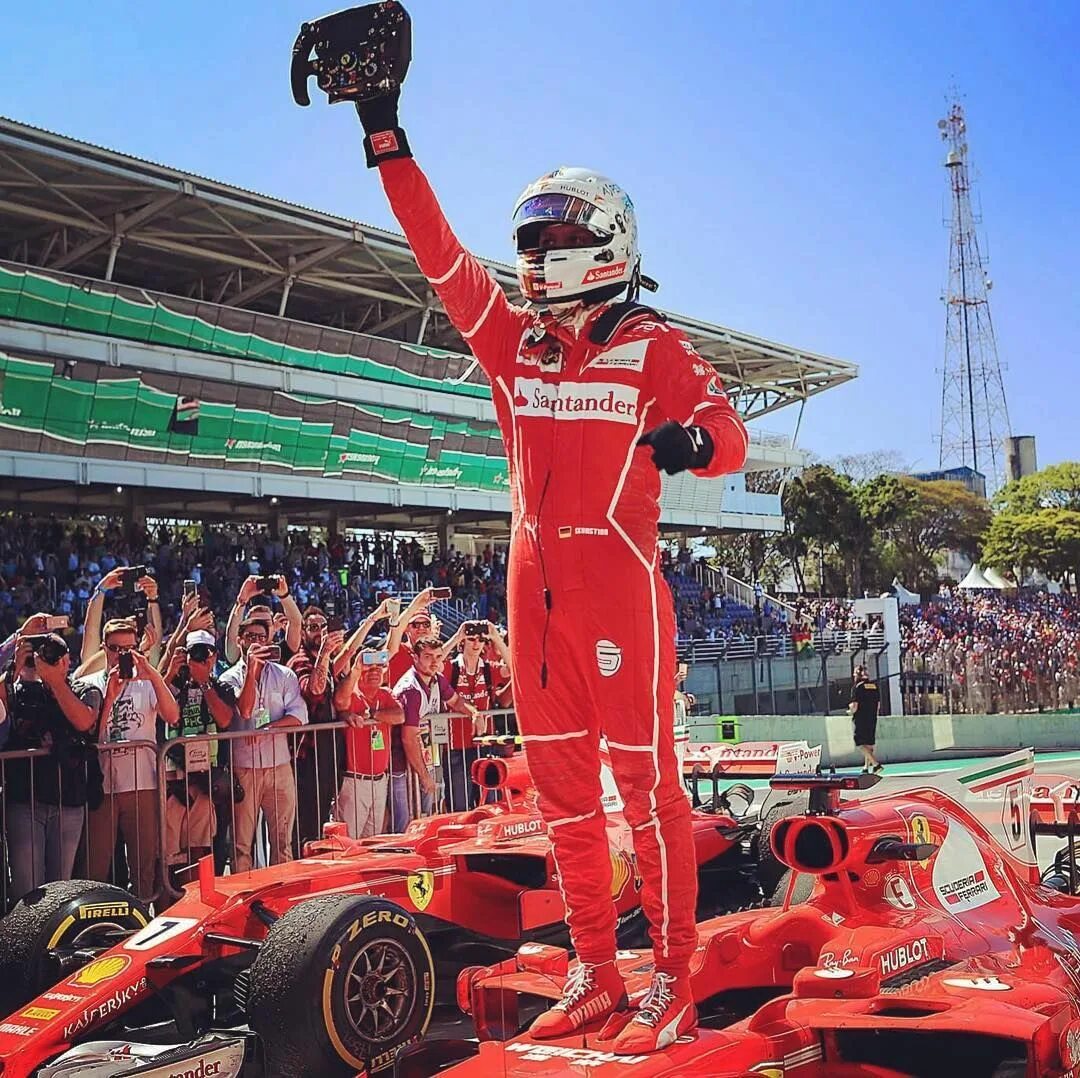 Техники формулы 1. Sebastian Vettel Ferrari. Себастьян Феттель победа. Себастьян Феттель 2017. Сан-Паулу трасса ф1.