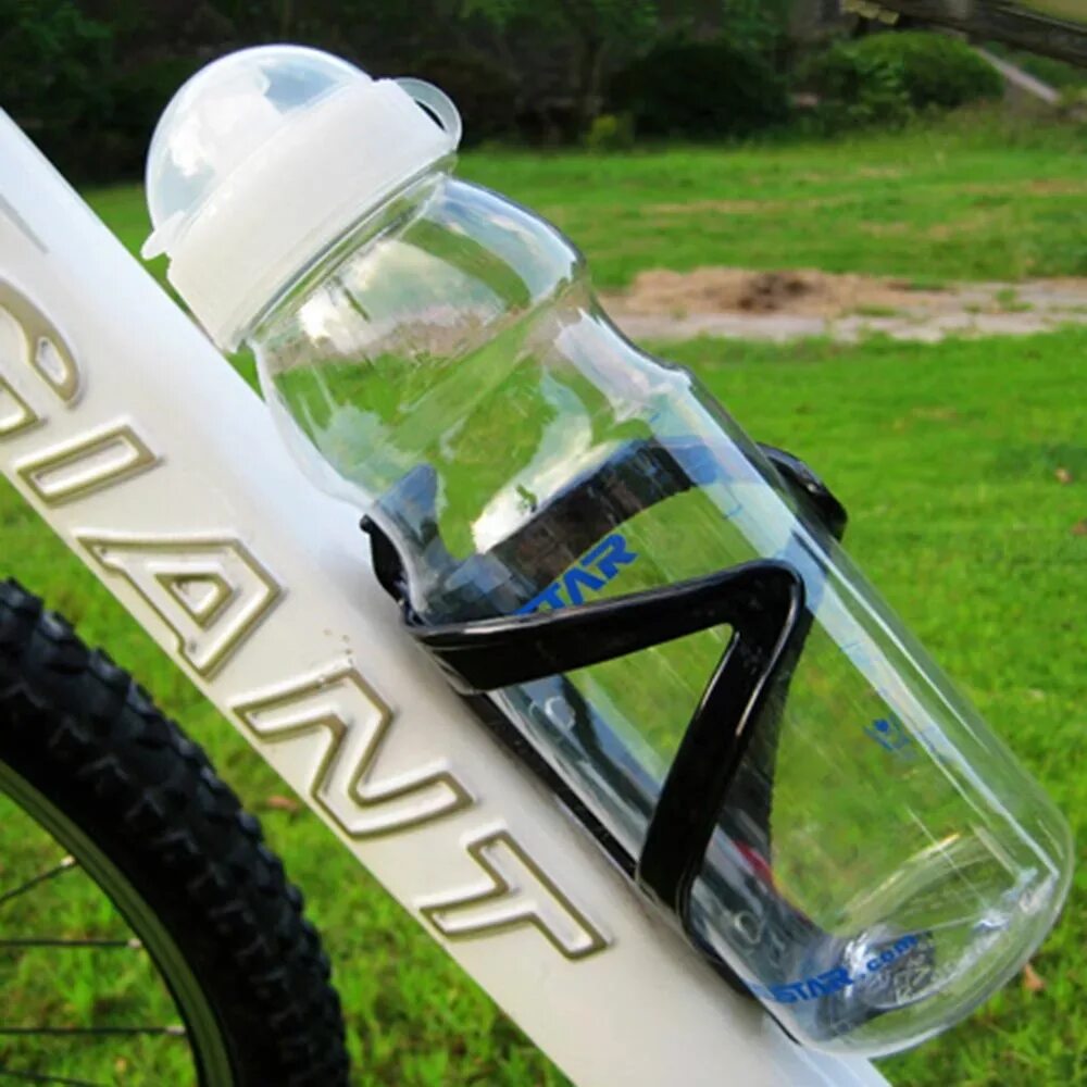 Держатель для бутылки на велосипед. Бутылка для велосипеда. Велосипедный держатель для бутылки. Держатель бутылки для велосипеда на раму. Велосипедные бутылки для воды с держателем.
