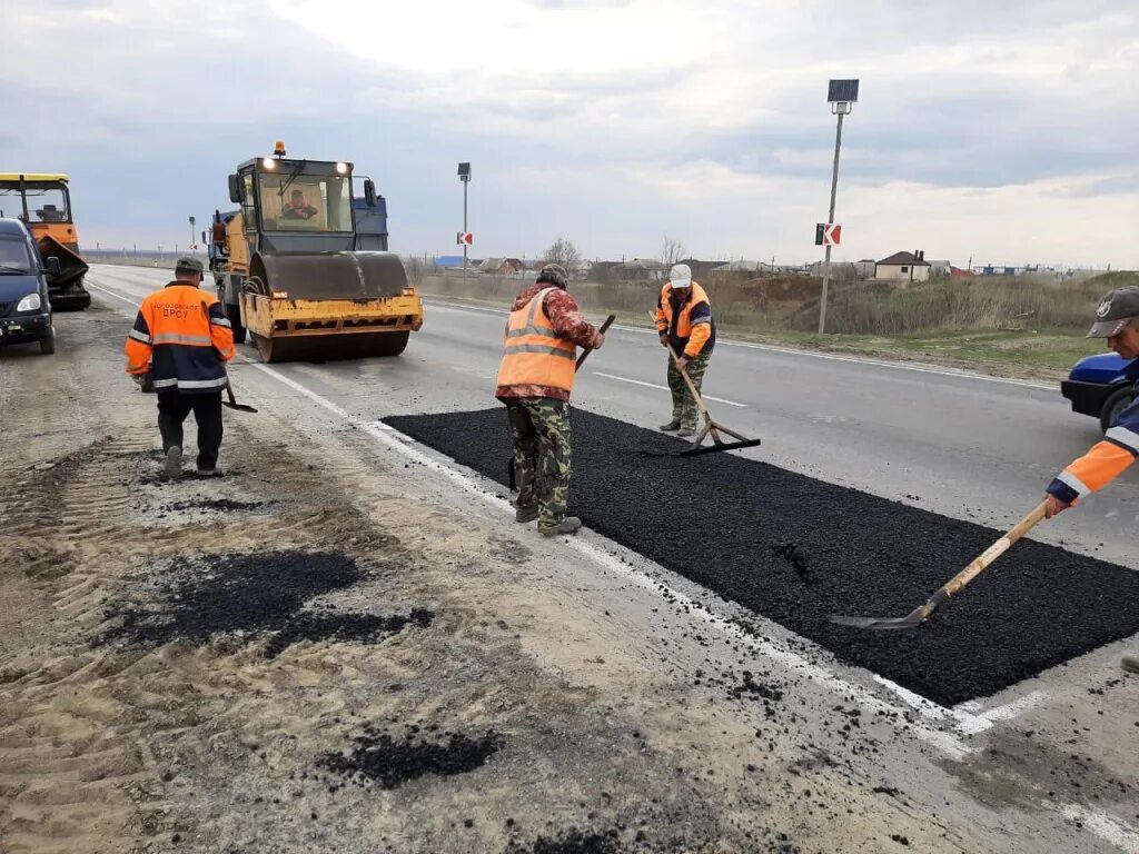 Ремонт дороги дон