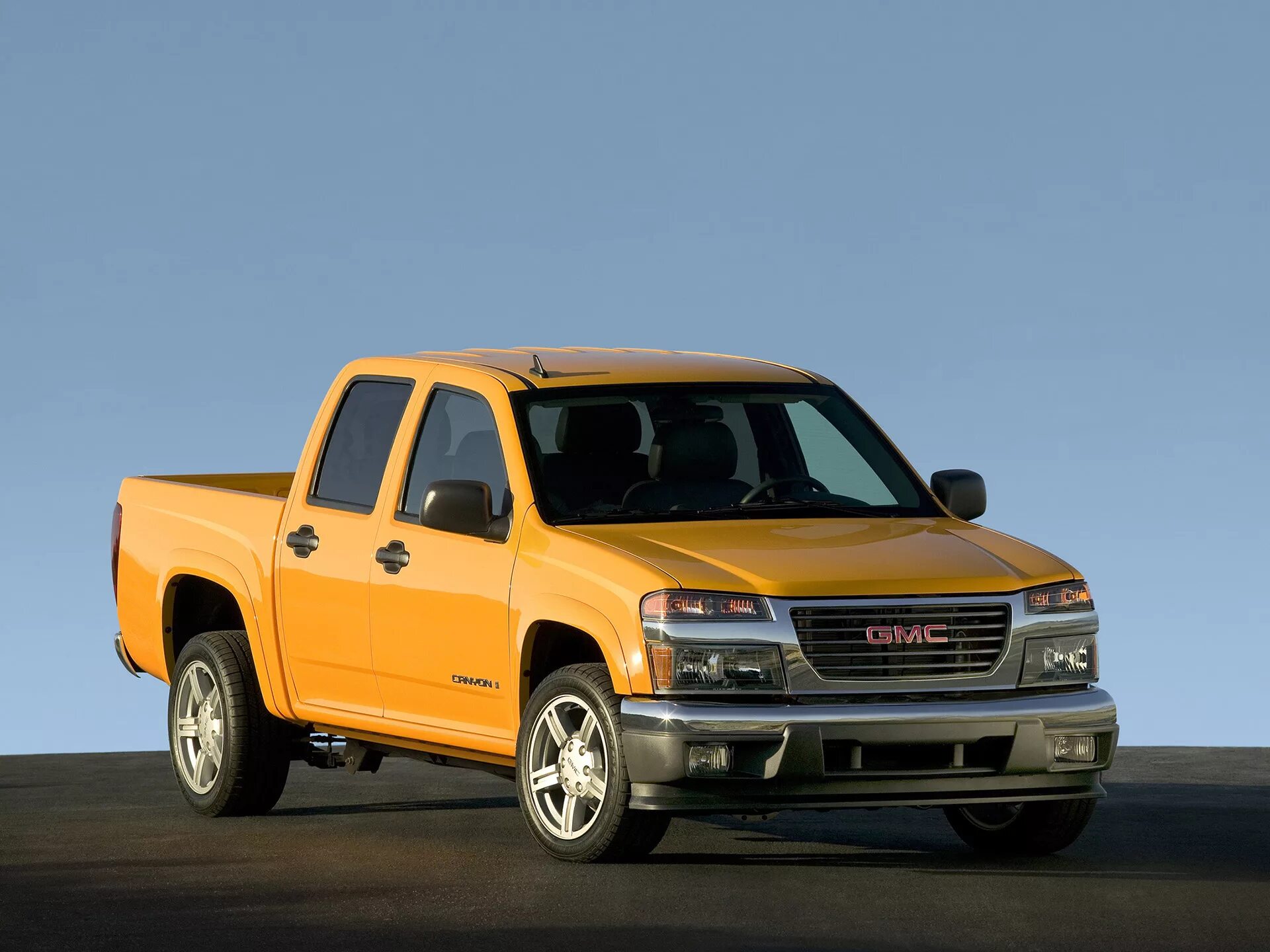 Автомобиль gmc. GMC Canyon 2006. GMC Canyon 2012. GMC Yukon пикап. GMC легковой.