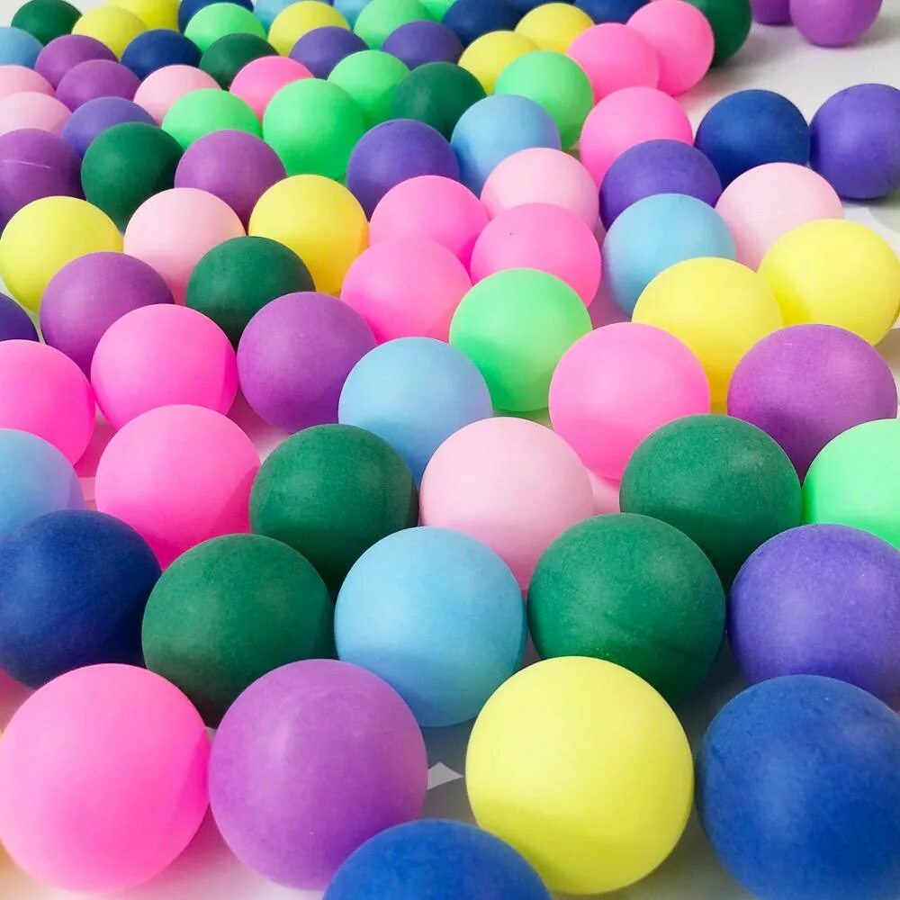 Разноцветные мячики. Разноцветные шарики. Теннисные шарики разноцветные. Мяч для пинг понга цветной.